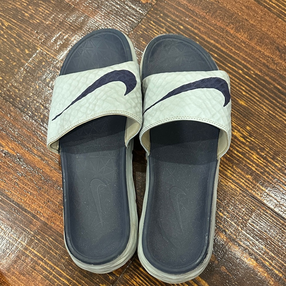 Nike Gray Slide Sandals with navy Logo